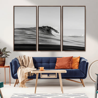 Striking black and white photo of a curling wave, ideal for modern coastal or minimalist wall decor settings.