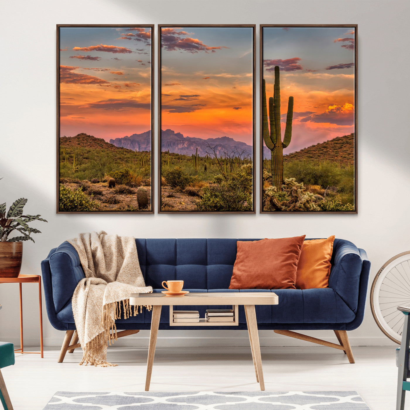 Vibrant desert sunset with saguaro cacti and distant mountains, perfect for Southwestern or warm-toned home decor.