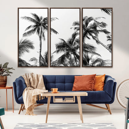 Black and white canvas of tall palm trees in moody tones, perfect for modern tropical minimalist or coastal-style home decor.