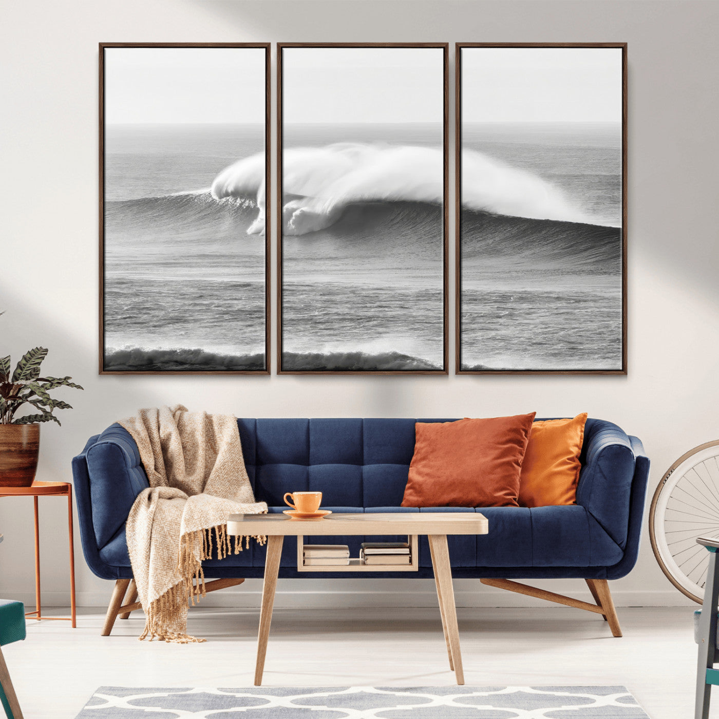 A dramatic black and white ocean wave crashing with immense force, capturing the raw power and movement of the sea in a bold seascape.