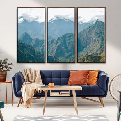 A misty mountain landscape with cloud-covered Andean peaks and lush green valleys, creating a dramatic and serene view, perfect for rustic or nature-inspired home decor.