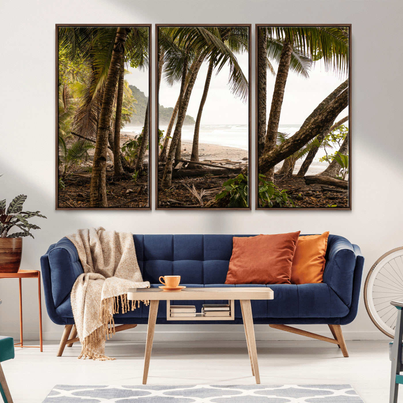 Dense tropical palm trees framing a sandy beach and ocean shore, ideal for jungle or coastal themed interior wall decor.