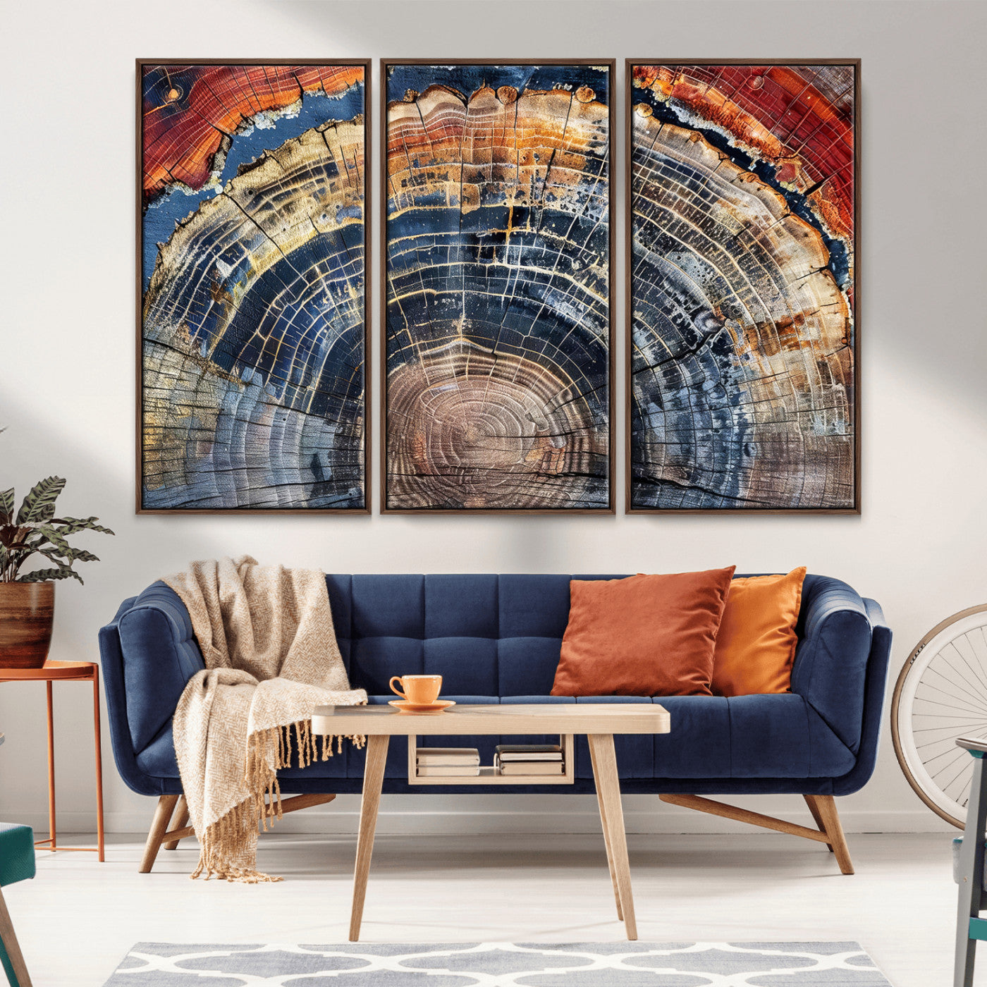 Vibrant tree ring with orange, brown, and blue tones in abstract detail, perfect for rustic or boho-inspired wall decor.