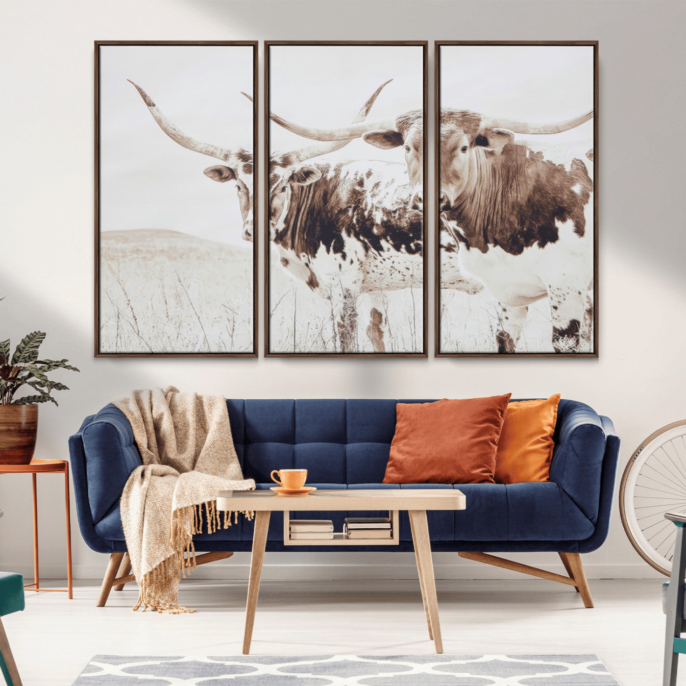 Two longhorn cows standing in a sepia-toned pasture with soft light, ideal for rustic or farmhouse-themed neutral wall decor.