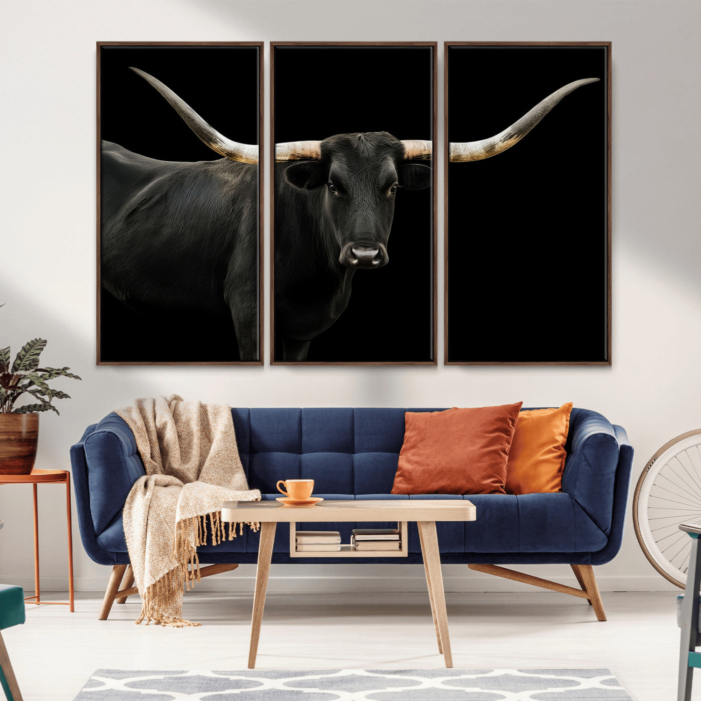 Close-up of a black Texas longhorn with large curved horns on black background, ideal for rustic farmhouse or modern western interiors.