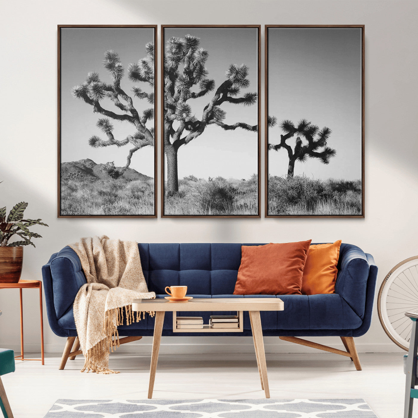 Black and white Joshua trees in a rugged desert landscape, creating a calm and minimalist feel for natural or rustic-themed interiors.