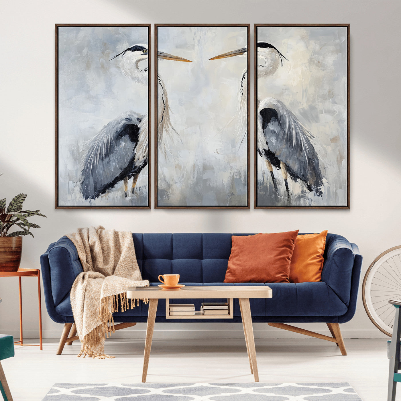 Two herons facing each other on a soft-toned background with blue-grey feathers, perfect for tranquil, coastal or nature-themed interiors.