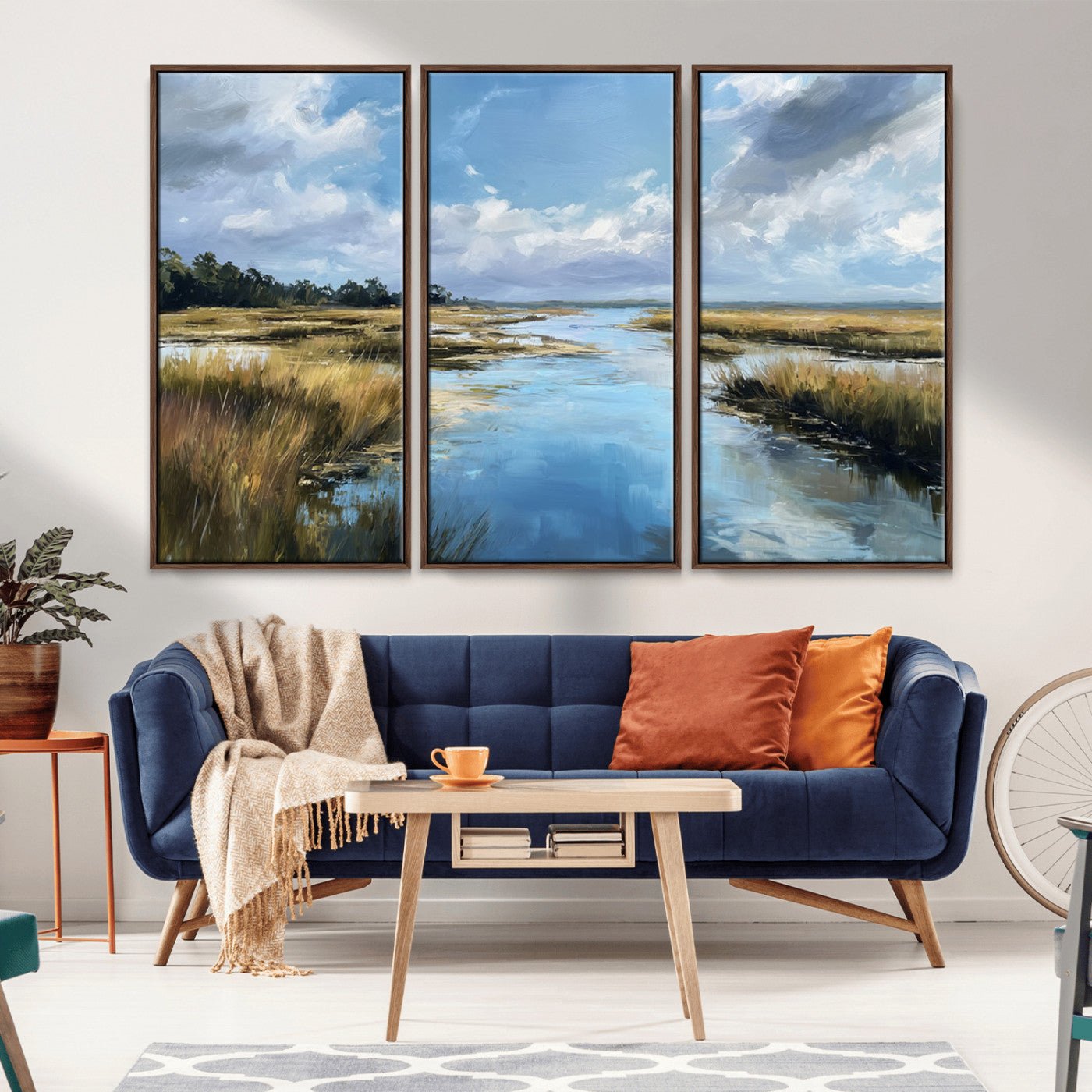 A beautiful, painterly landscape of a calm river winding through a marsh, with vibrant green grasses and a bright blue sky filled with fluffy clouds.