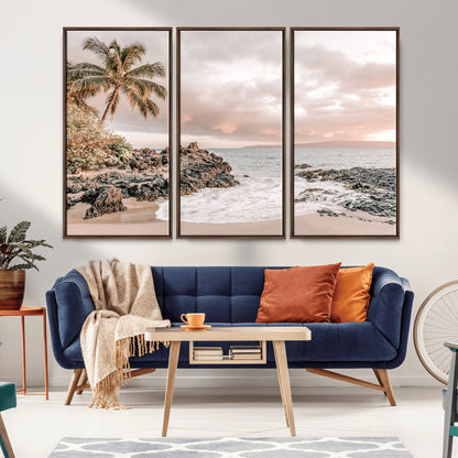 A peaceful beach scene with a palm tree and rocks, soft waves washing onto the shore under a soft pastel sky at sunset.