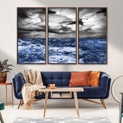 Moody canvas wall art of a stormy ocean under a dramatic black-and-white sky, perfect for bold or coastal-style interiors.