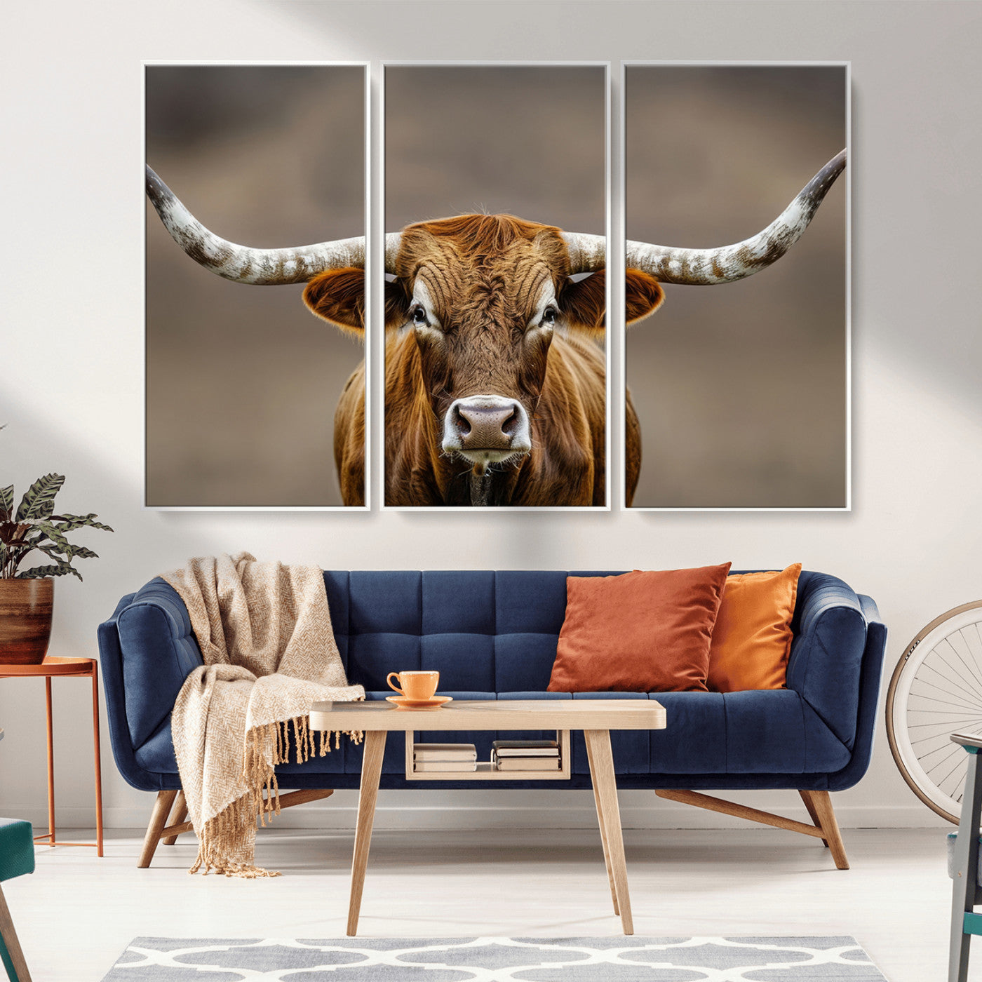 Close-up of a Texas Longhorn with strong curved horns and warm brown tones, perfect for rustic or western-style wall decor.