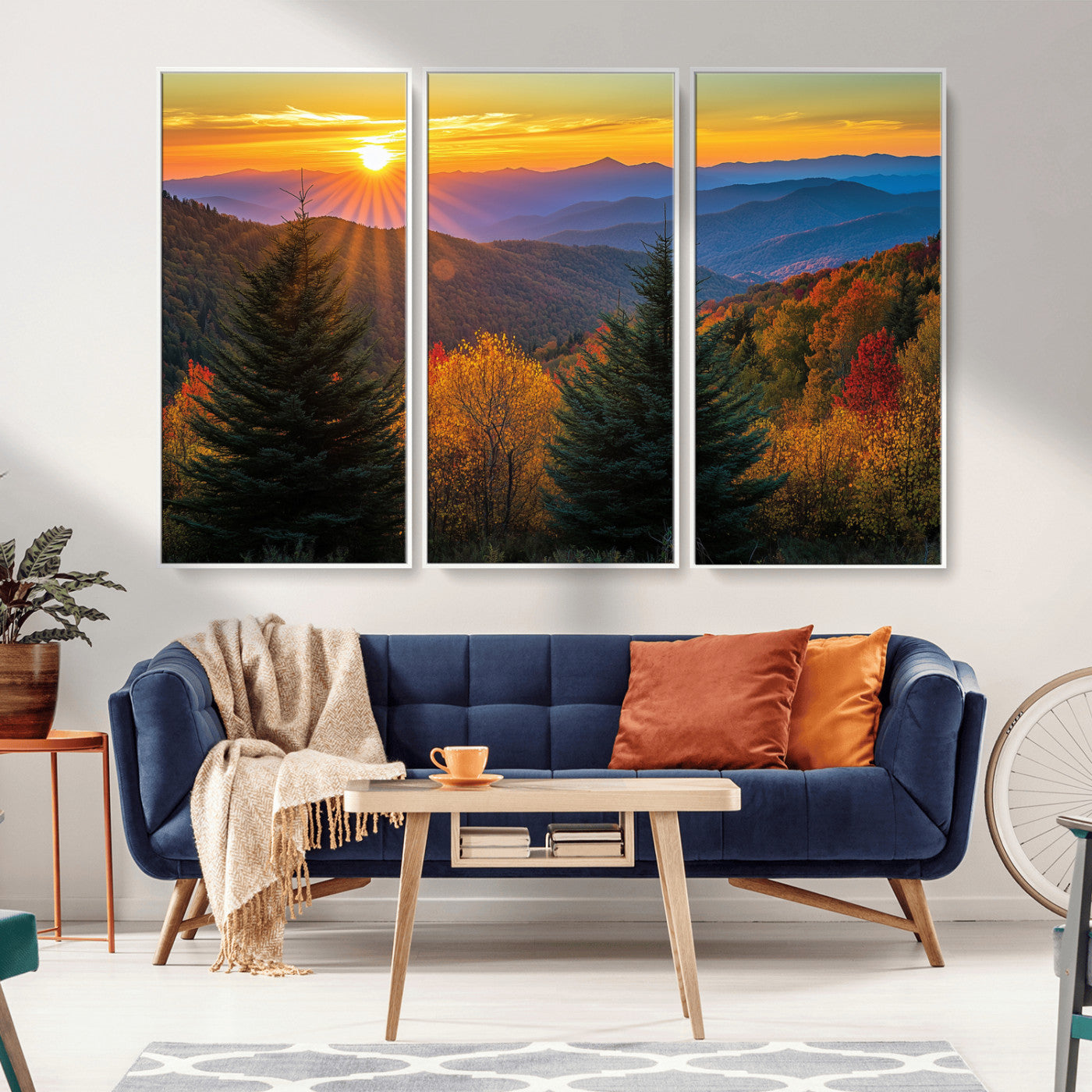 Vibrant sunset over autumn mountains with colorful trees and warm light, ideal for nature lovers or cabin-style wall decor.