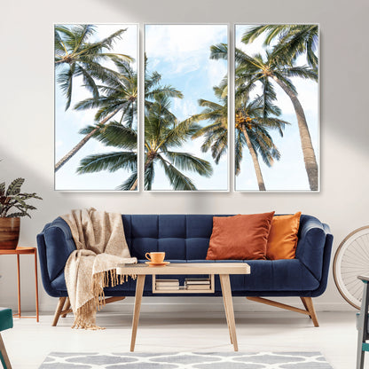 Framed canvas of tall palm trees reaching into a tropical sky, ideal for beach home or relaxed island-inspired wall decor.