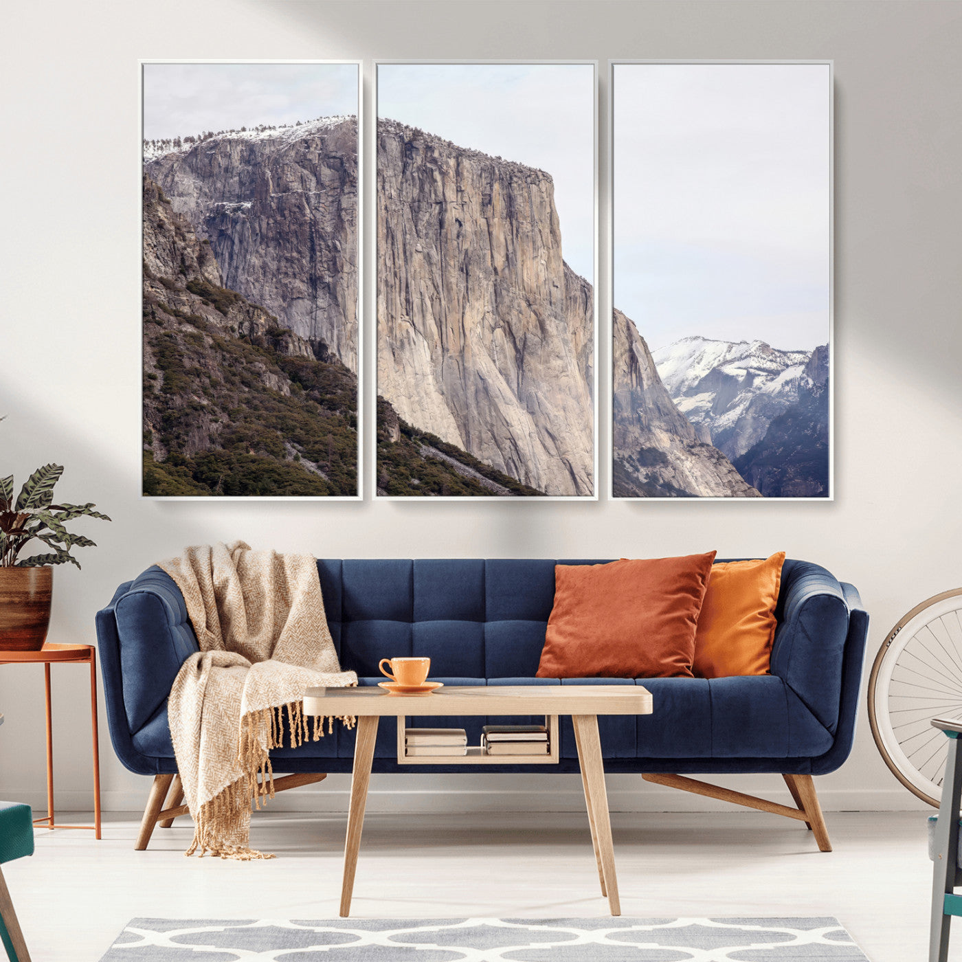 Framed canvas of El Capitan’s vertical granite face in Yosemite with snowy peaks, ideal for Sierra minimalism or mountain-inspired decor.