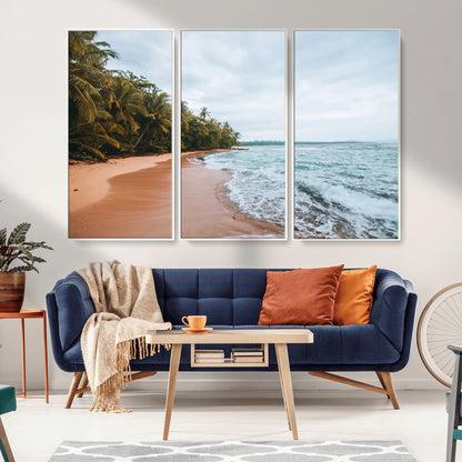Framed canvas of a tropical beach with palm trees and soft waves, ideal for coastal escape or serene nature-inspired home decor.
