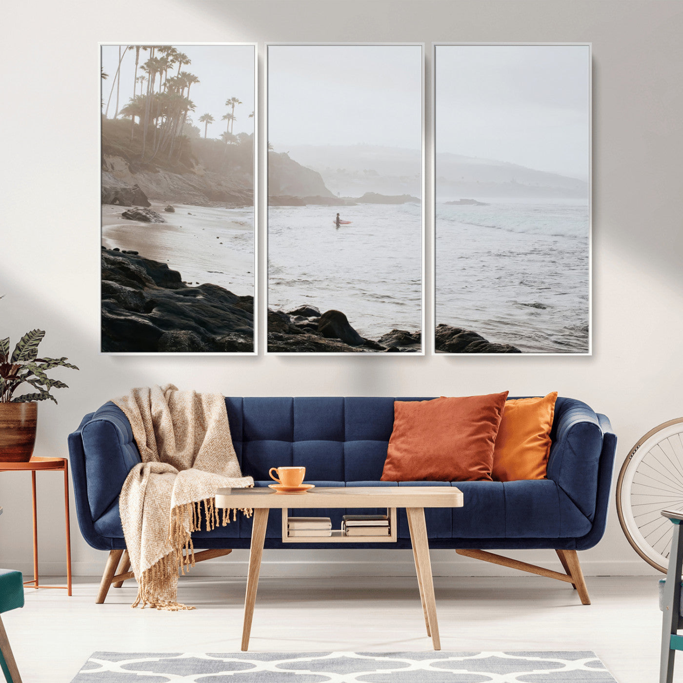 Framed canvas of a surfer in misty coastal tones at a foggy California beach, ideal for minimalist coastal beach or serene ocean-themed decor.