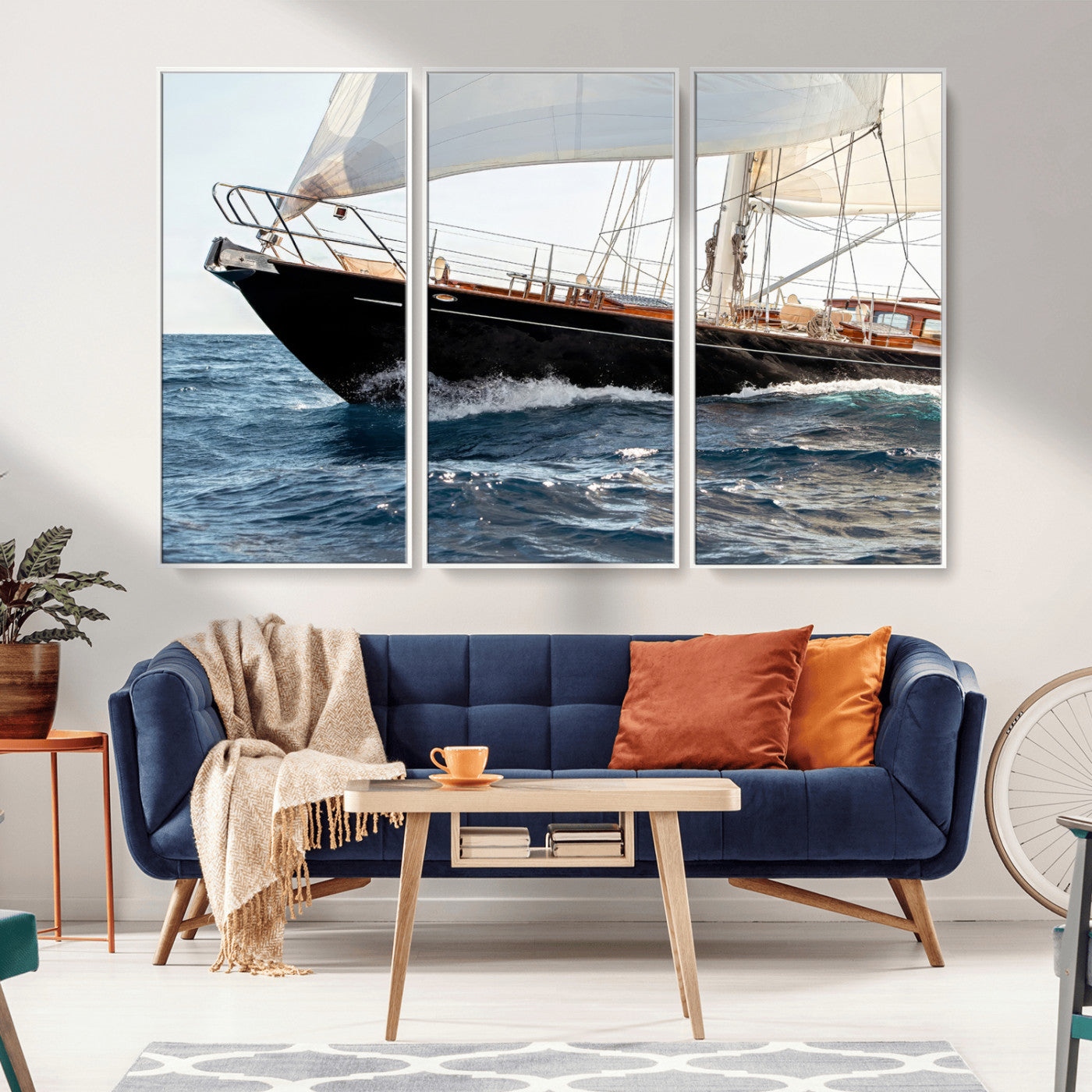 Close-up of a classic sailing yacht with wooden deck and full sails, perfect for nautical or coastal-style decor in ocean-themed spaces.