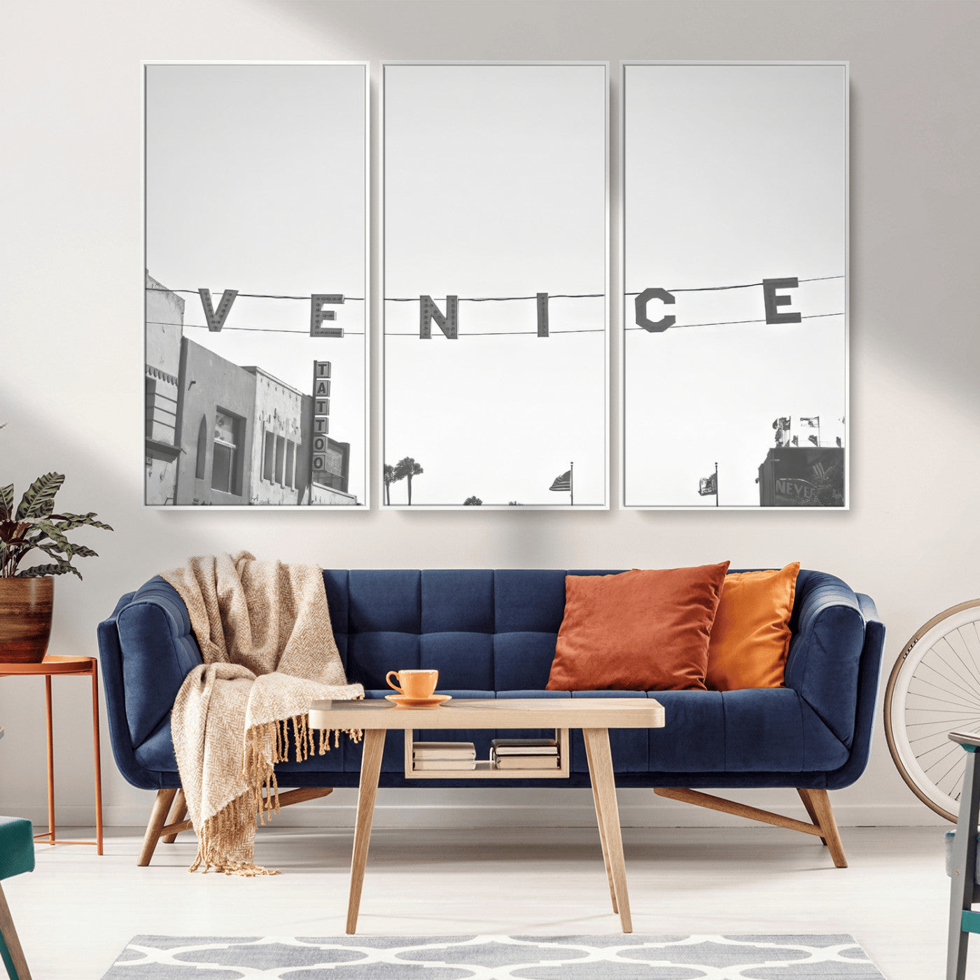 Black and white photo of Venice Beach sign and palm-lined street, perfect for urban coastal or minimalist LA-inspired wall decoration.