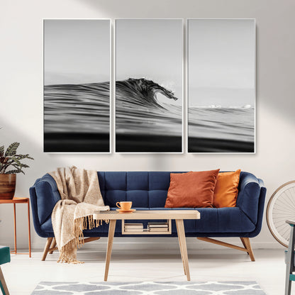 Striking black and white photo of a curling wave, ideal for modern coastal or minimalist wall decor settings.