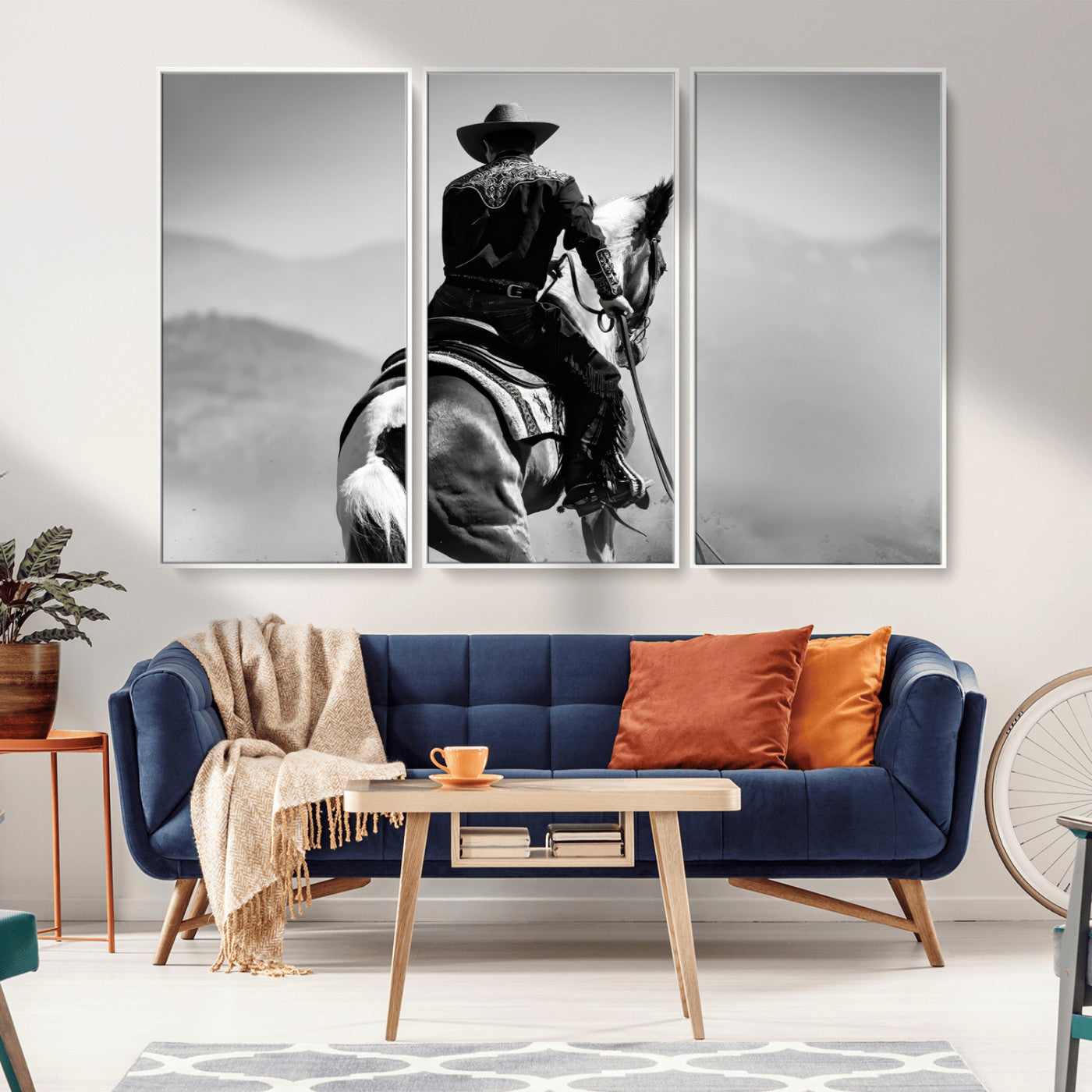 Black and white canvas of a cowboy on horseback with moody tones, perfect for rustic western or country-inspired home decor.