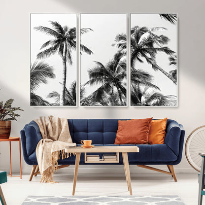 Black and white canvas of tall palm trees in moody tones, perfect for modern tropical minimalist or coastal-style home decor.