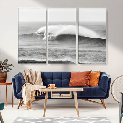 A dramatic black and white ocean wave crashing with immense force, capturing the raw power and movement of the sea in a bold seascape.