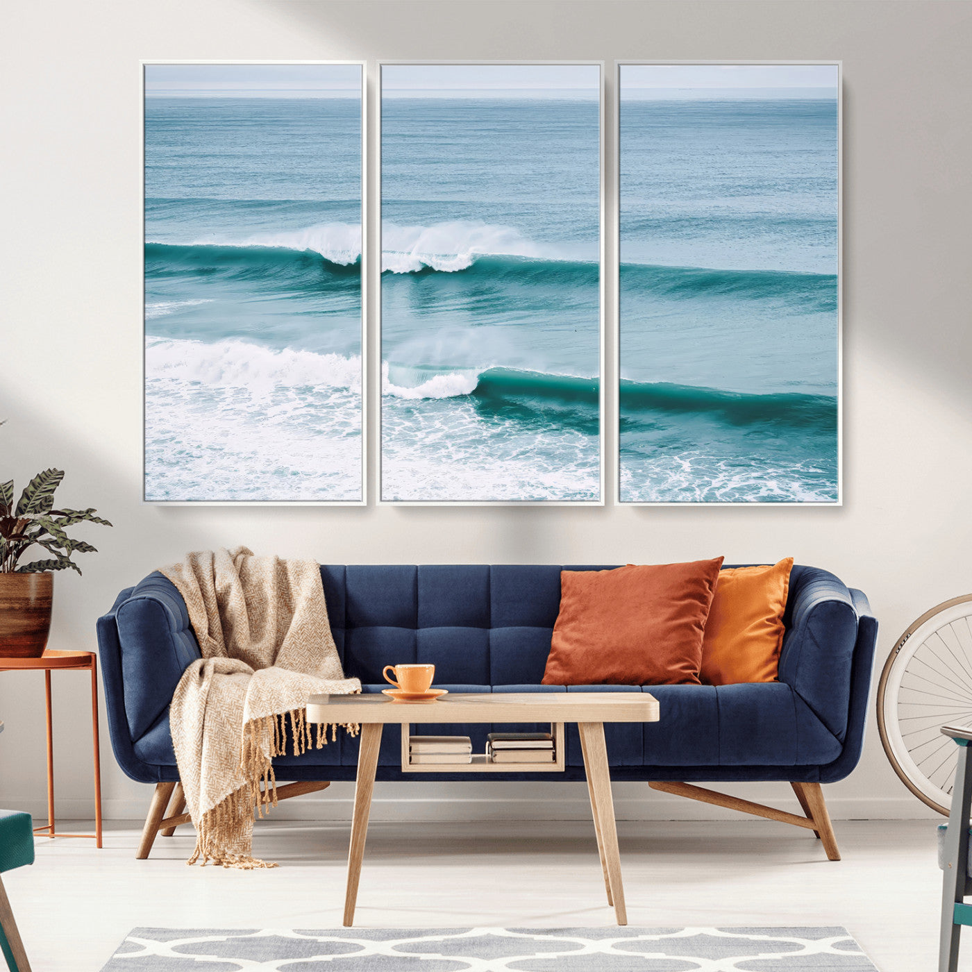 Powerful ocean waves rolling towards the shore, their turquoise hues blending with white sea foam under an open horizon, capturing the essence of the ocean's movement.