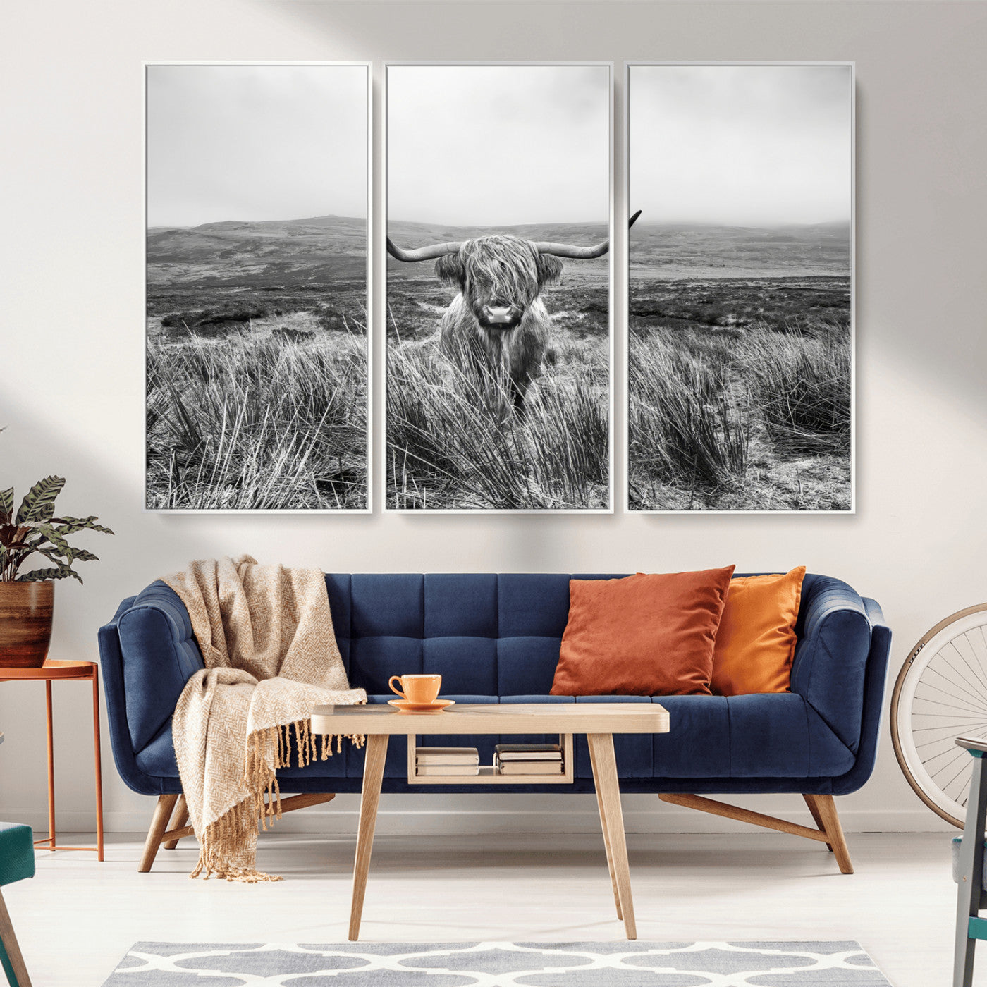 A black and white portrait of a Highland cow in a foggy Scottish countryside, capturing a rustic aesthetic and tranquil farm escape.