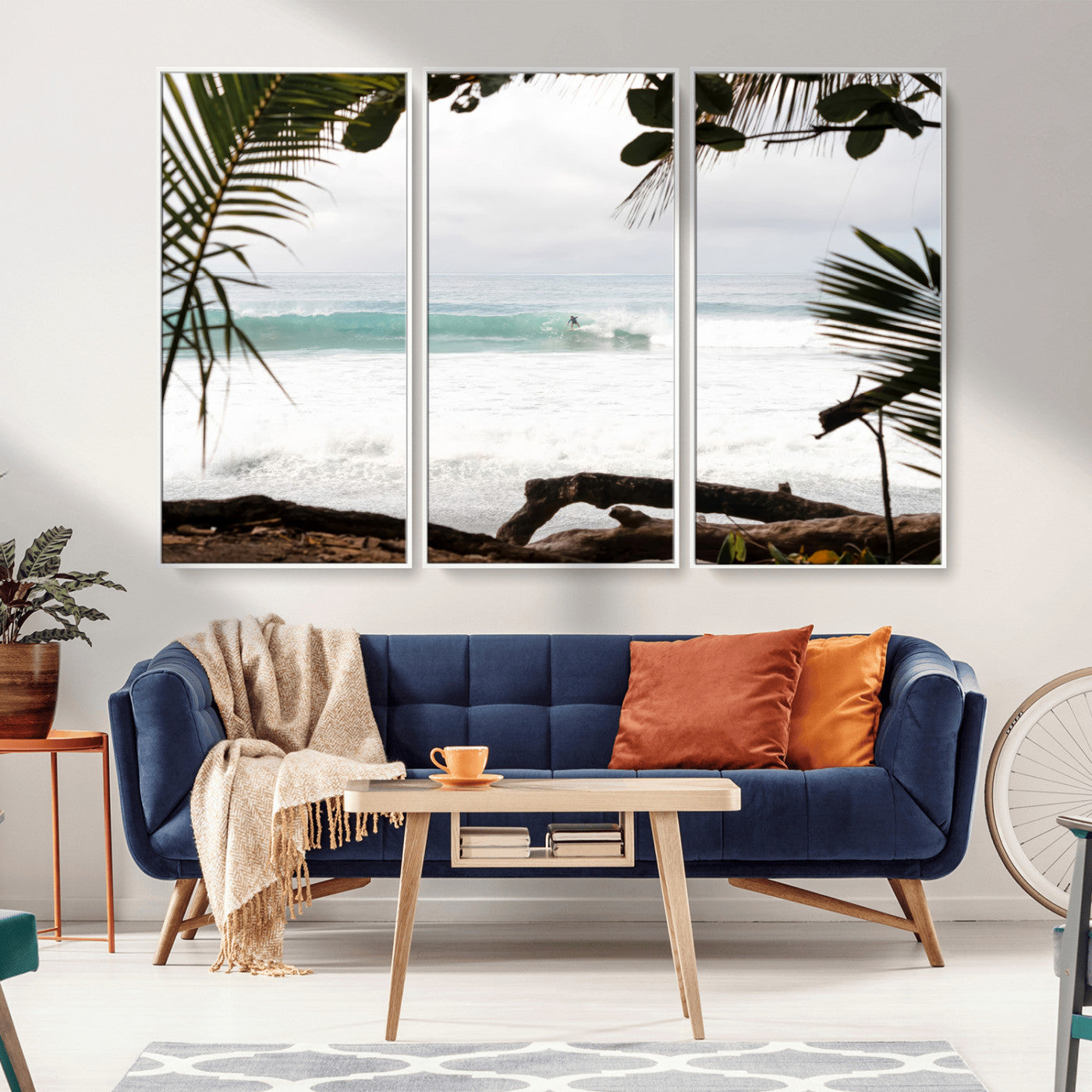 Tropical beach view with palm trees and surfer riding a wave, perfect for boho or coastal-inspired interior wall decor.