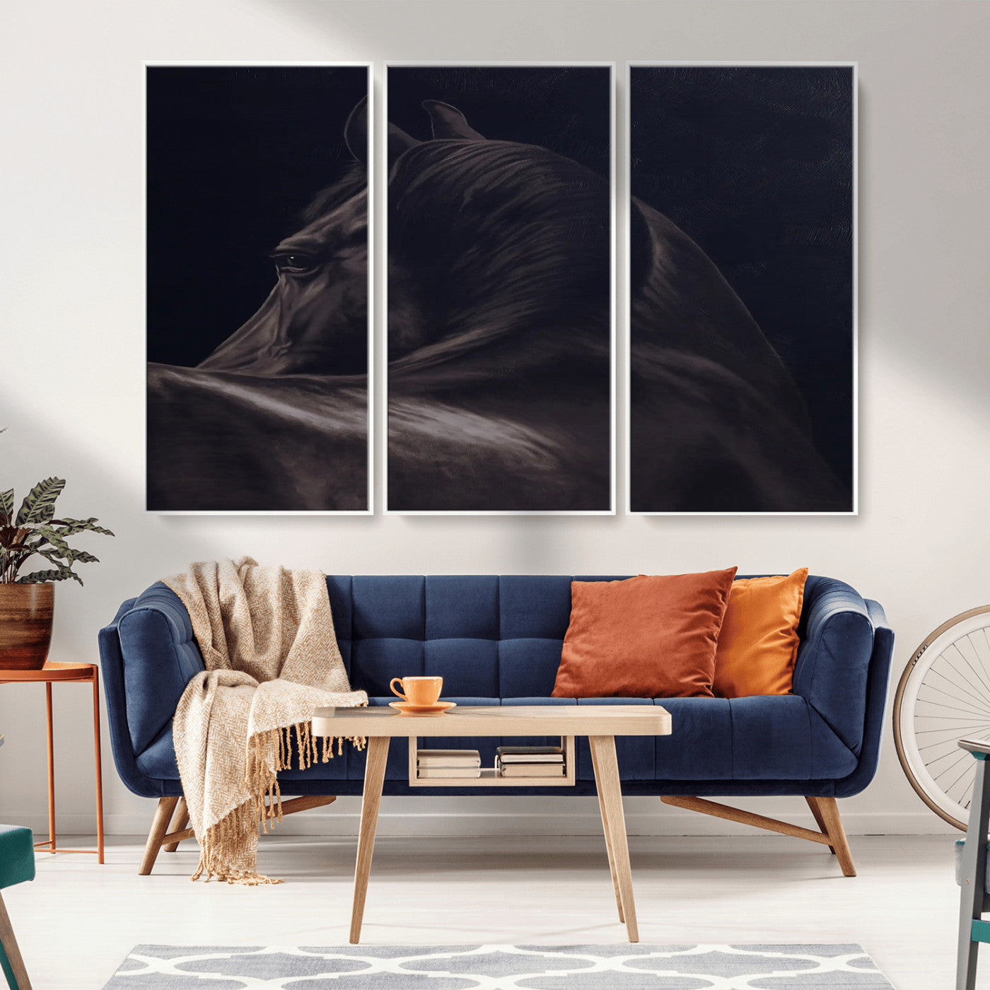 Close-up of a black horse with dramatic lighting on a dark background, perfect for rustic or masculine home decor.