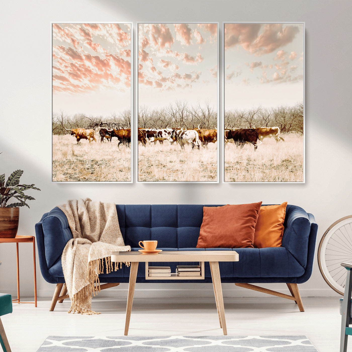 Cattle herd in a soft-toned field under a pastel pink sky, creating a peaceful rustic feel, perfect for farmhouse or western-themed spaces.
