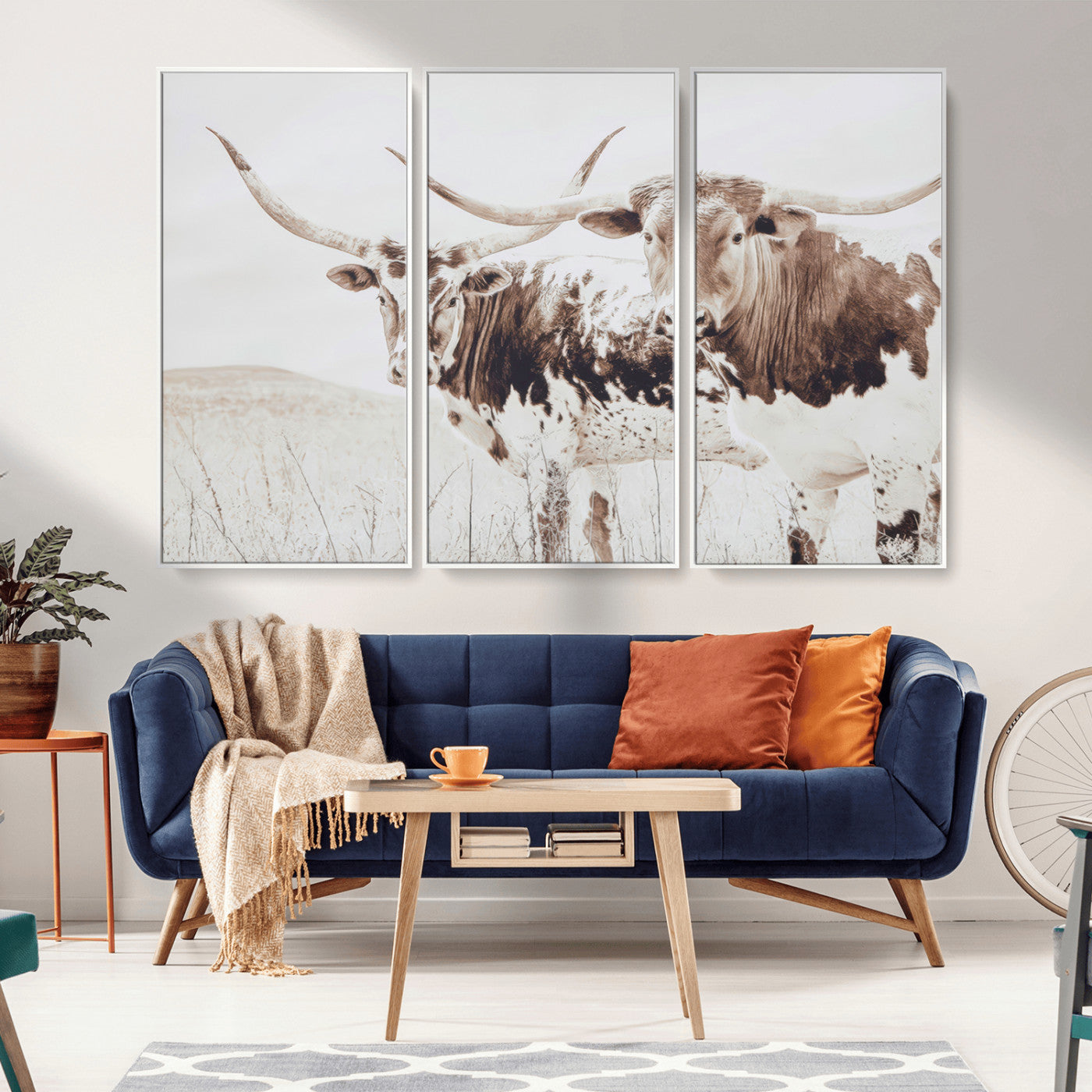 Two longhorn cows standing in a sepia-toned pasture with soft light, ideal for rustic or farmhouse-themed neutral wall decor.