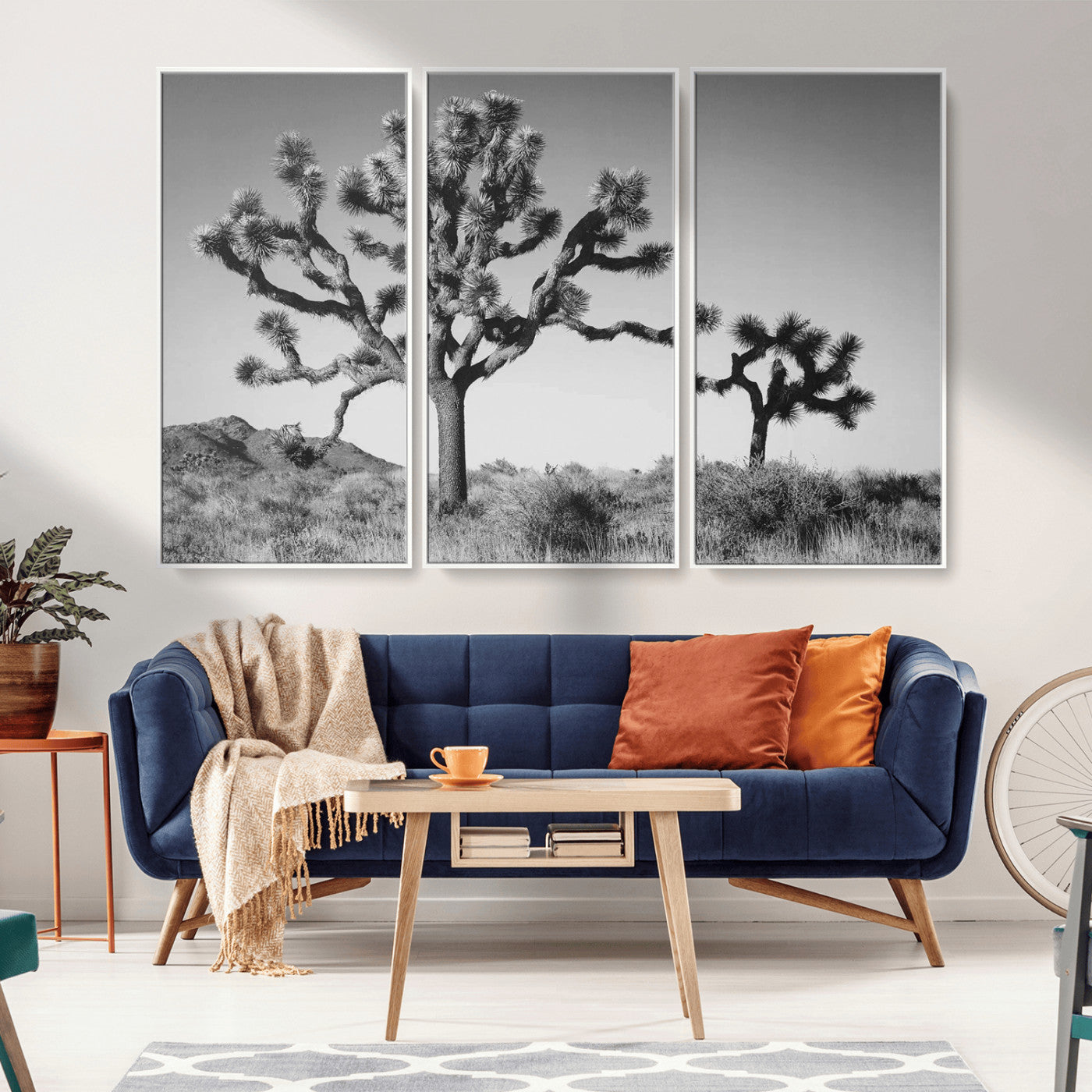 Black and white Joshua trees in a rugged desert landscape, creating a calm and minimalist feel for natural or rustic-themed interiors.