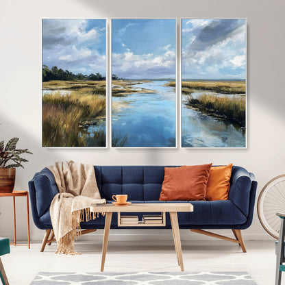 A beautiful, painterly landscape of a calm river winding through a marsh, with vibrant green grasses and a bright blue sky filled with fluffy clouds.