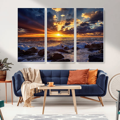 An explosive sunset over the ocean with dramatic clouds and rays of sunlight reflecting off the water, creating a vibrant and captivating view.