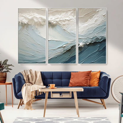 Textured canvas of ocean waves in soft coastal blues and creamy whites, ideal for modern or minimalist coastal-style interiors.