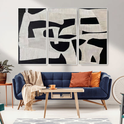 Minimalist black and white canvas featuring bold abstract textures and geometric shapes, ideal for modern neutral decor.
