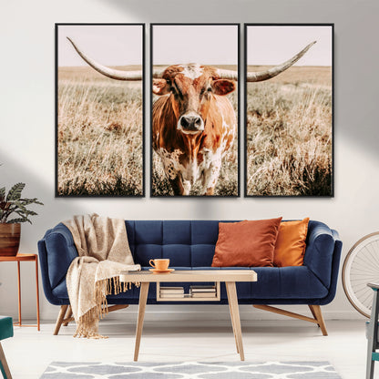 Framed longhorn cow canvas wall art with rustic prairie background, western animal print perfect for farmhouse or ranch style decor