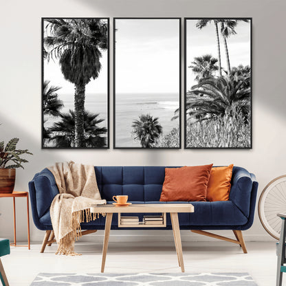 Monochrome canvas of palm trees framing a coastal surf scene, perfect for California-inspired or retro black-and-white beach decor.
