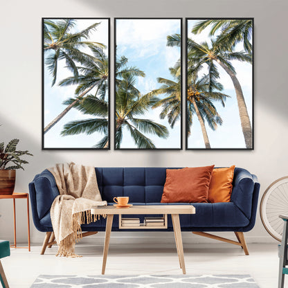 Framed canvas of tall palm trees reaching into a tropical sky, ideal for beach home or relaxed island-inspired wall decor.