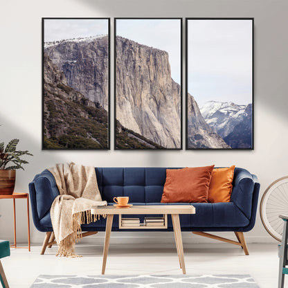 Framed canvas of El Capitan’s vertical granite face in Yosemite with snowy peaks, ideal for Sierra minimalism or mountain-inspired decor.