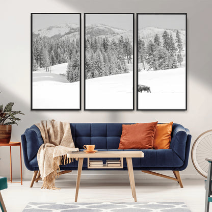 Snowy bison walking through white forest landscape, ideal for monochrome winter or wilderness-style interior wall decoration.