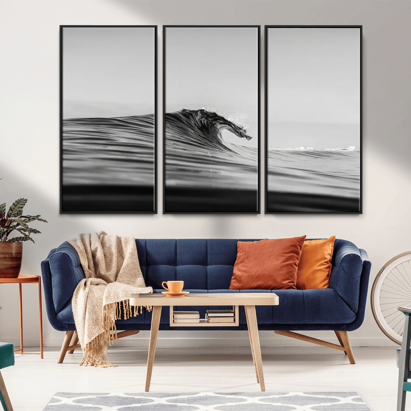 Striking black and white photo of a curling wave, ideal for modern coastal or minimalist wall decor settings.