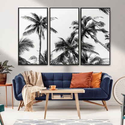 Black and white canvas of tall palm trees in moody tones, perfect for modern tropical minimalist or coastal-style home decor.