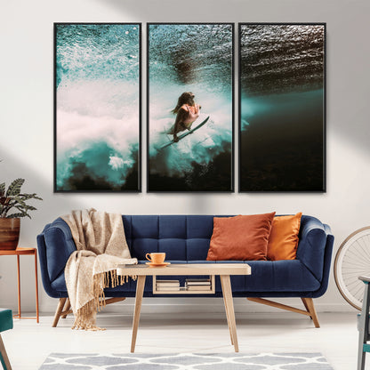 Vibrant underwater photo of a female surfer diving through turquoise waves, perfect for coastal boho or surf-inspired home decor.