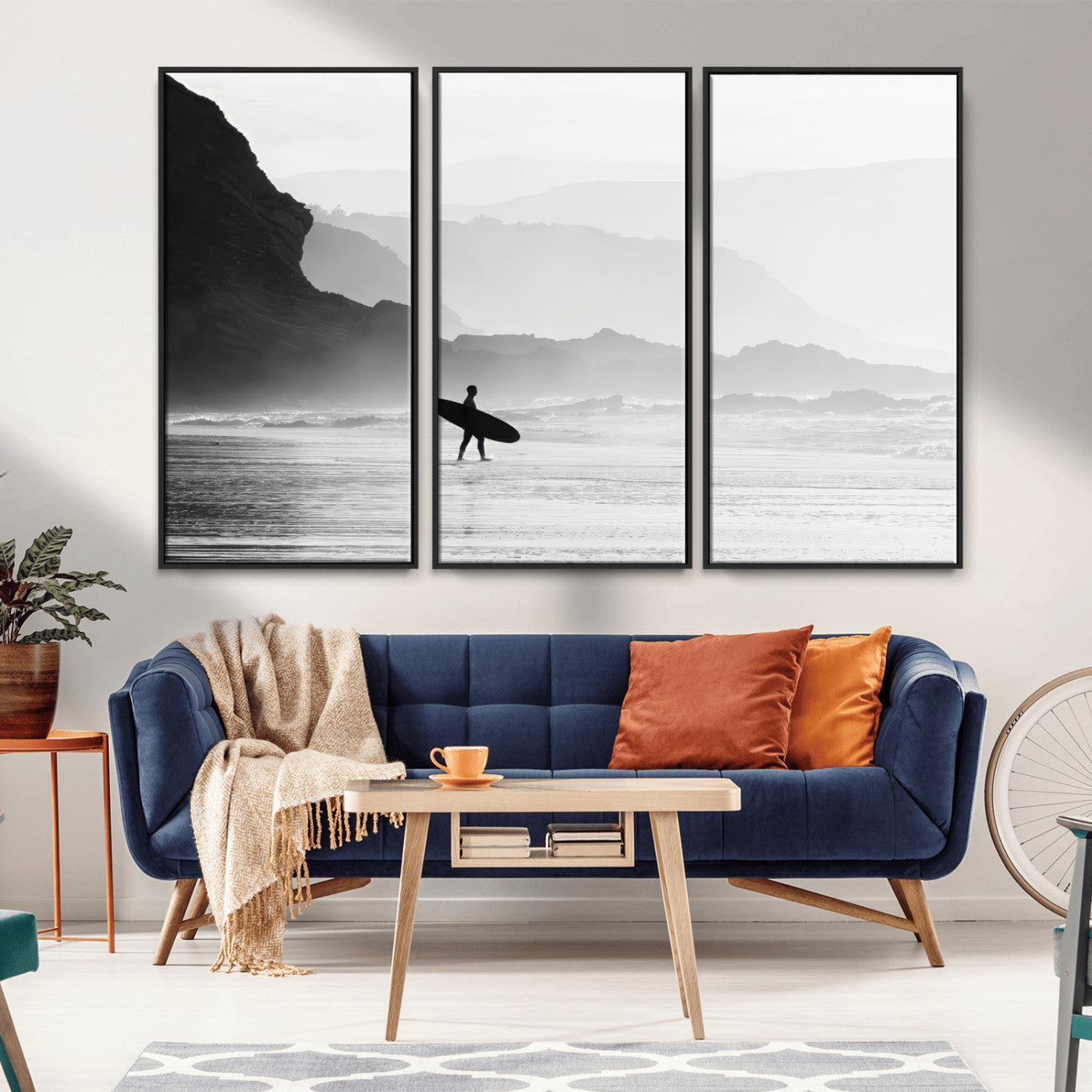 A lone surfer walking along a misty beach with cliffs in the background, carrying their board, capturing a serene and minimal ocean moment.