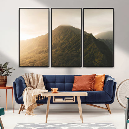 Sunlit mountain peak with mist rolling over its rugged slopes, bathed in golden light, creating a warm and tranquil nature-inspired scene.