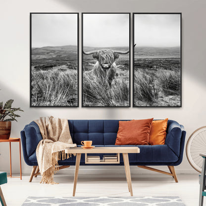 A black and white portrait of a Highland cow in a foggy Scottish countryside, capturing a rustic aesthetic and tranquil farm escape.