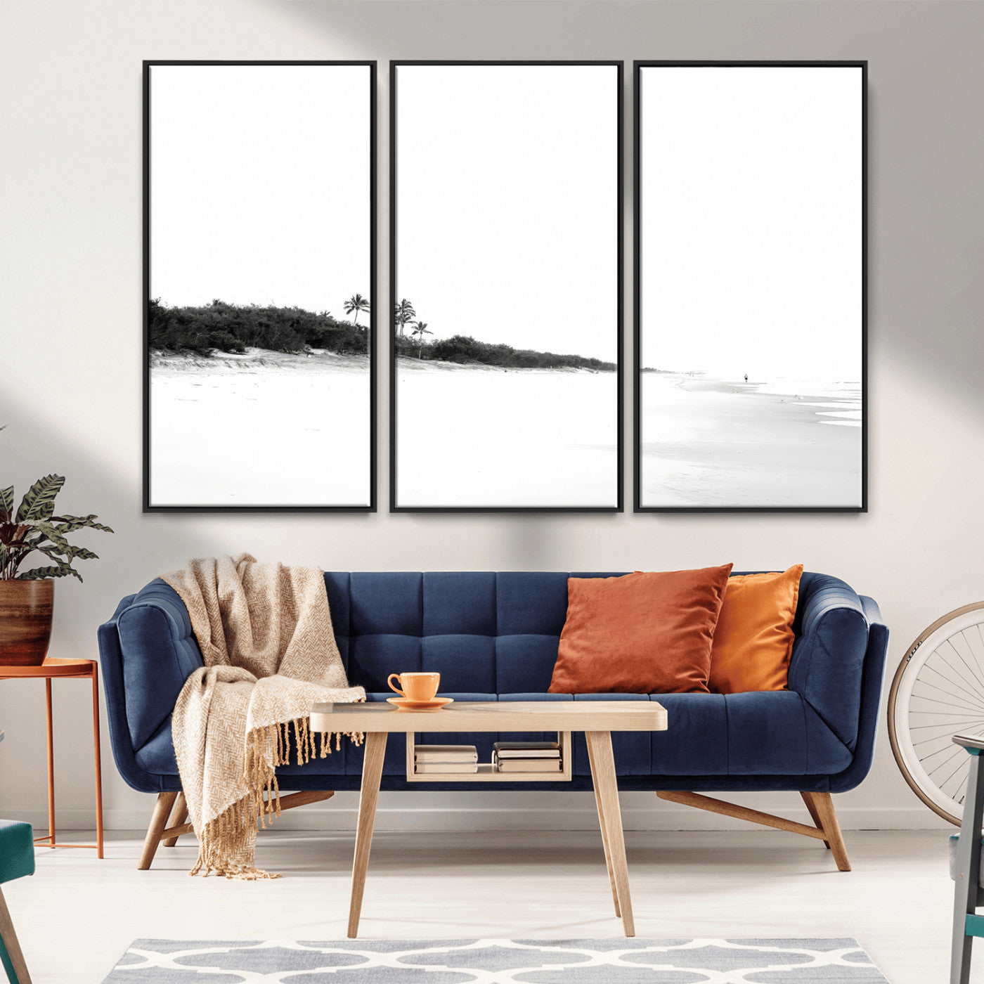 A black and white minimalist coastal scene with a vast open beach, distant palm trees, and a lone figure walking along the shoreline, evoking serenity and solitude.