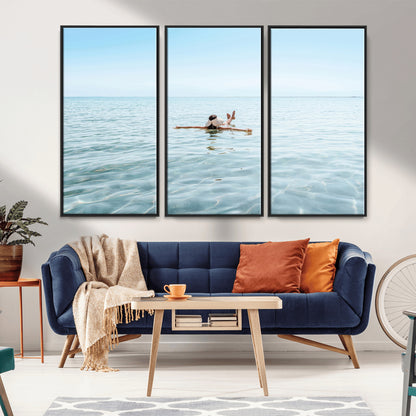 A peaceful minimalist scene of a person floating on crystal-clear water, surrounded by a vast open horizon, capturing relaxation and serenity in a tranquil aquatic setting.